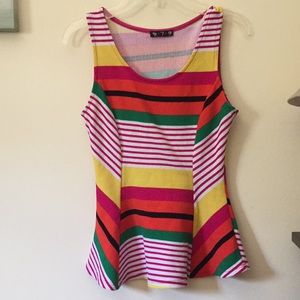 This is a colorful peplum top